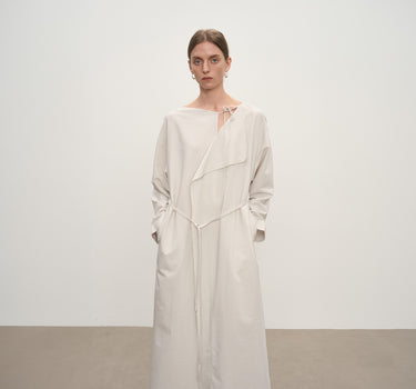 Discover the Ultimate in Comfort and Style: The Draped Wool Swing Neck Dress