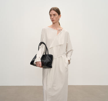 Discover the Ultimate in Comfort and Style: The Draped Wool Swing Neck Dress