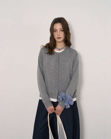 Sophisticated Striped Patchwork Cardigan with Ruffled Hem