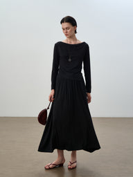 Elegant Two-Piece Outfit with Sculpted Hemline